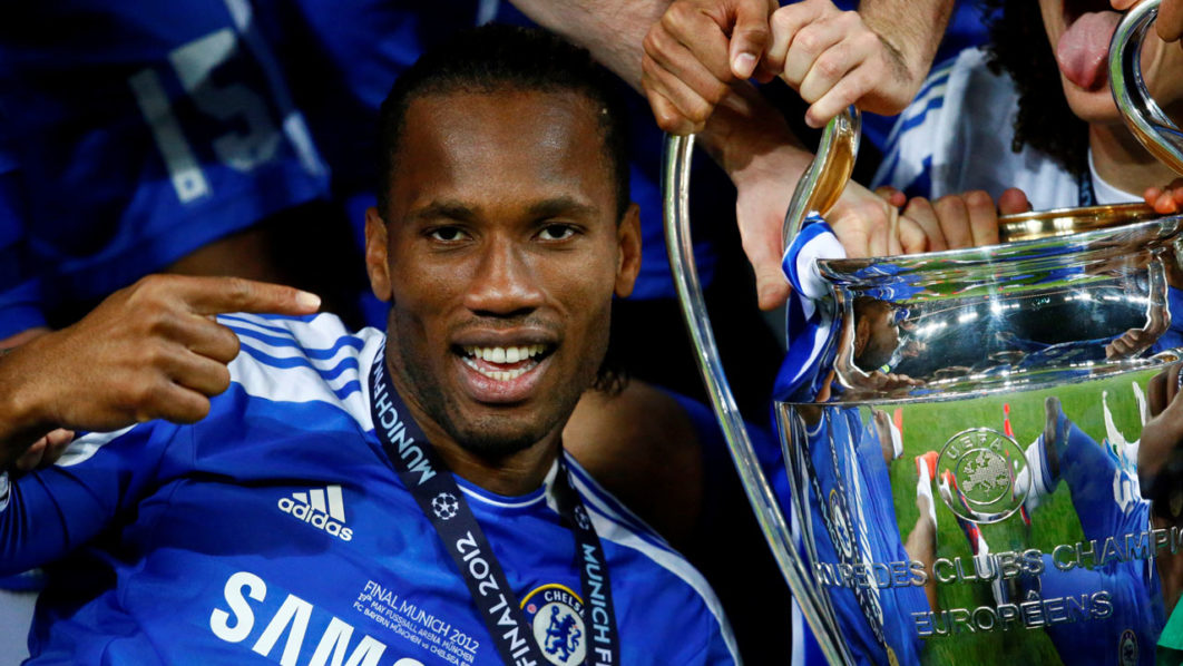 FILE PHOTO: Chelsea’s Drogba celebrates with the trophy after their Champions League final soccer match against Bayern Munich at the Allianz Arena in Munich