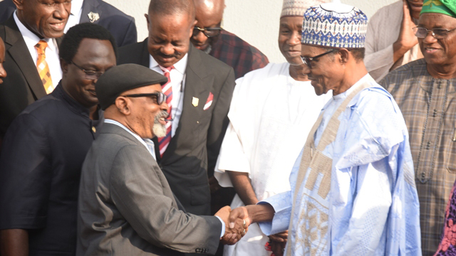 Pic 14. From left: President Muhammadu Buhari congratulating the
