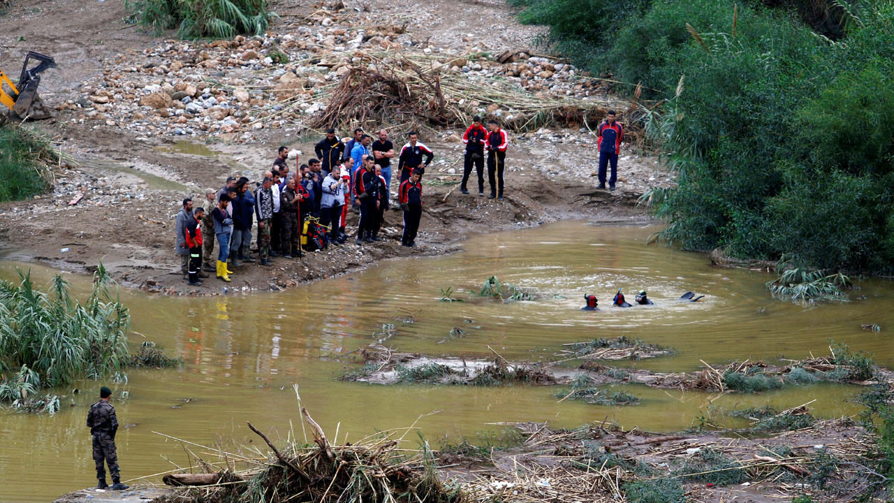 Divers search a swollen river in Kyrenia