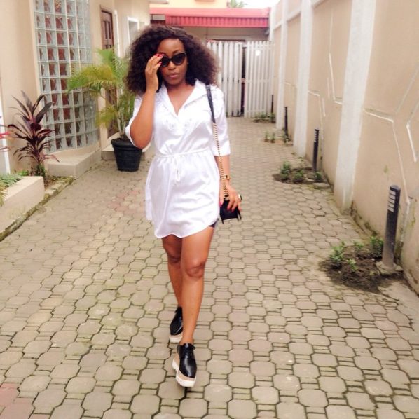 Rita Dominic wearing a shirt dress