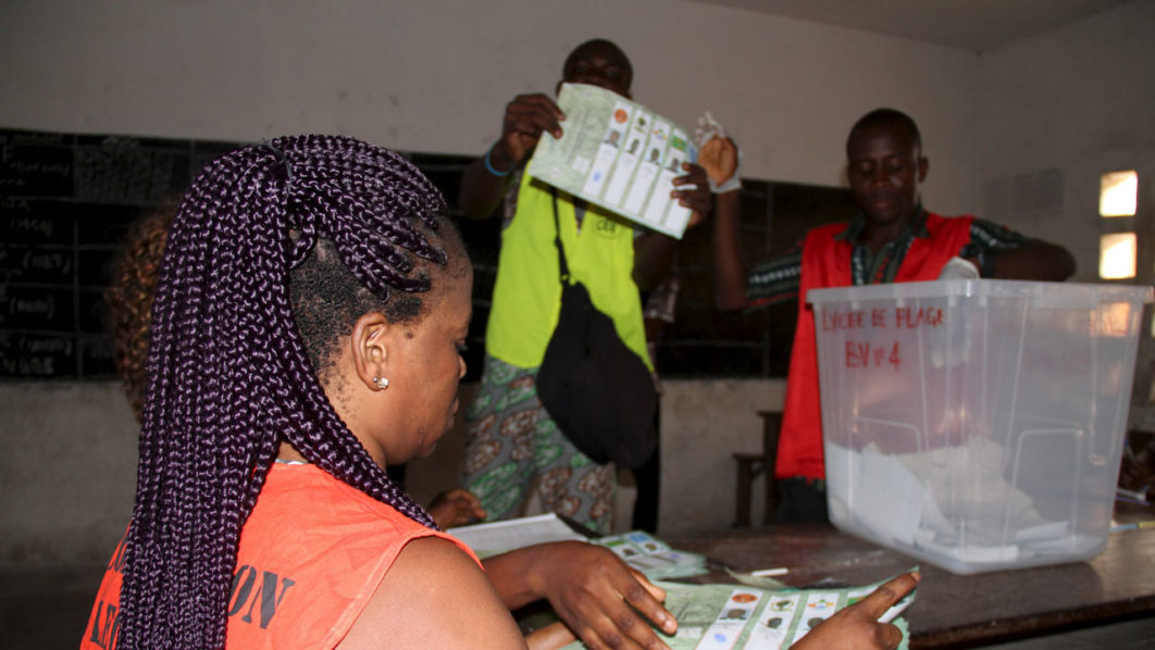 Election workers count votes of the 2015 presidential elections of Togo, in Lome