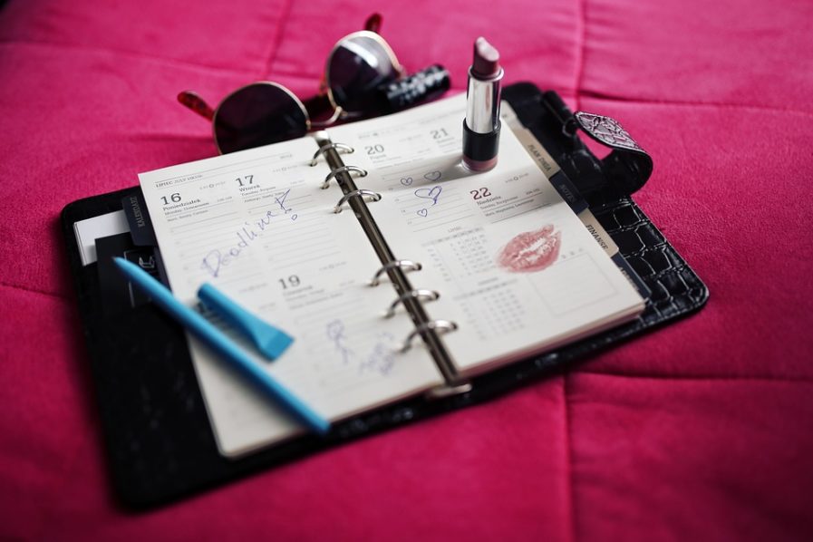 A woman’s calender with lipstick stain