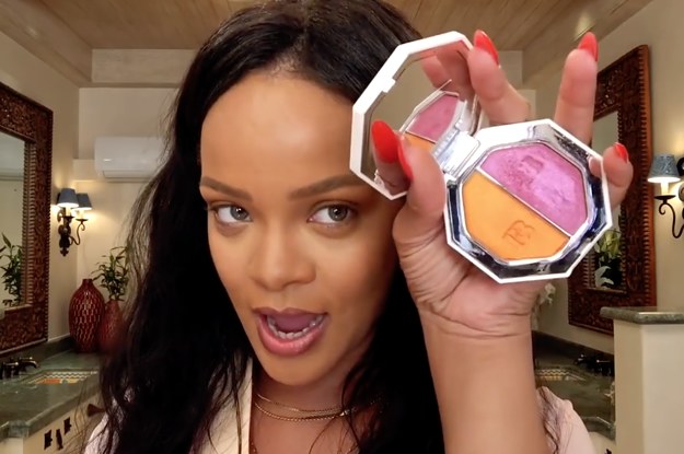Rihanna using a blush from her Fenty Beauty product