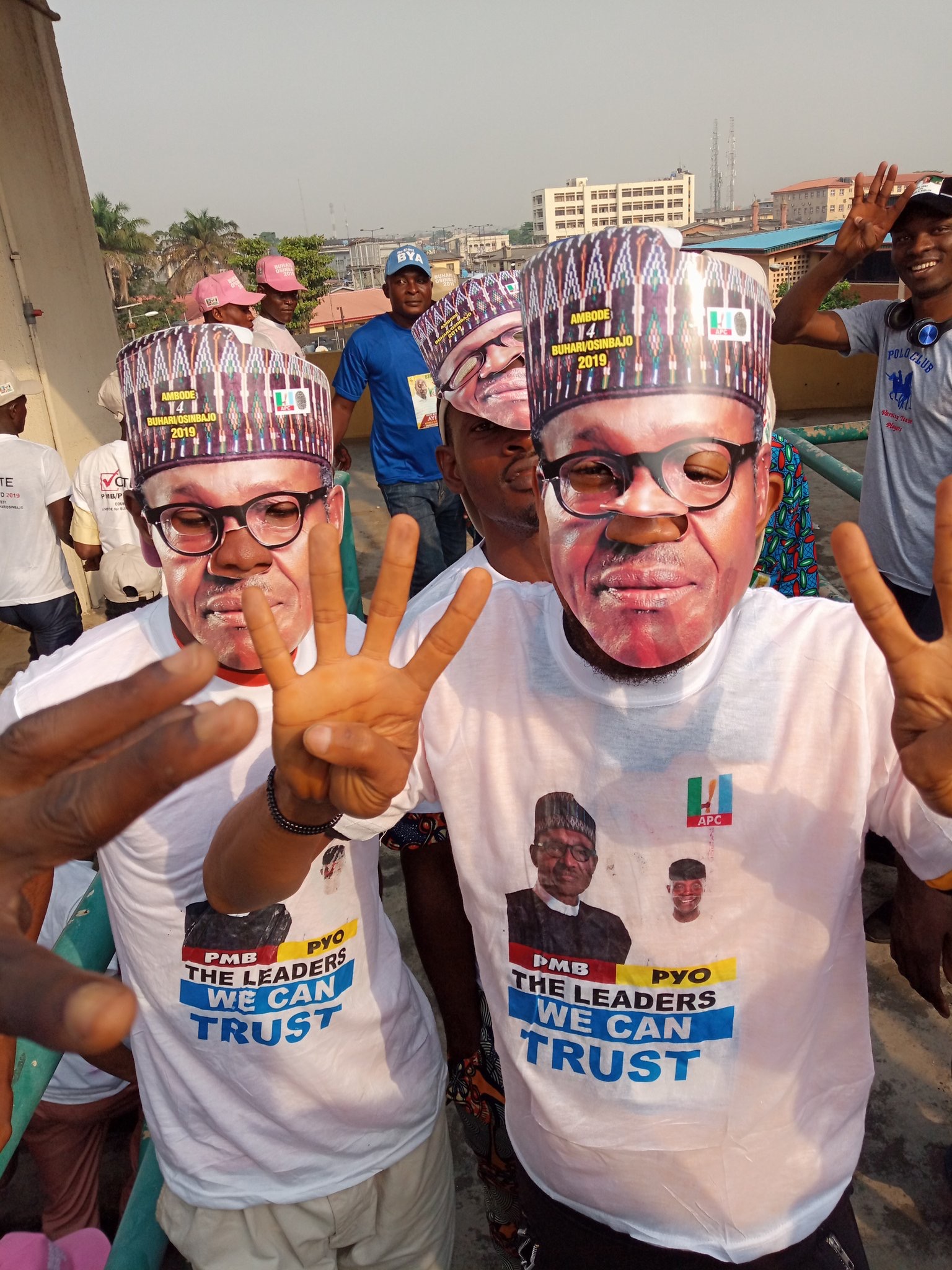 Supporters wearing Buhari Face Masks, Photo. Twitter