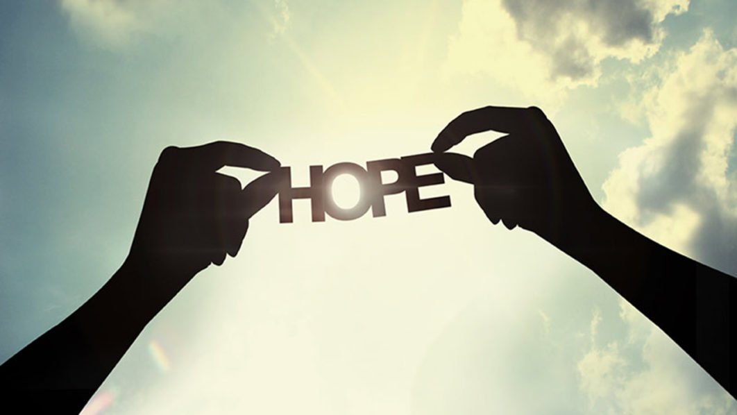 hopearmsraisedskycreditShutterstockcom
