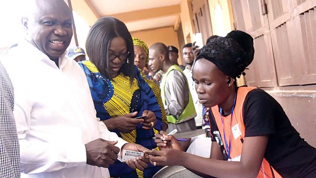 Ambode-&-Wife-Vote-March-9+