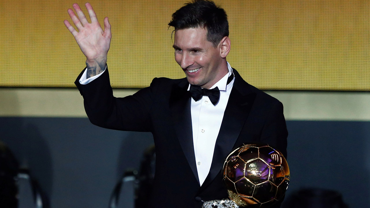 Messi of Argentina holds the World Player of the Year award during the FIFA Ballon d’Or 2015 ceremony in Zurich