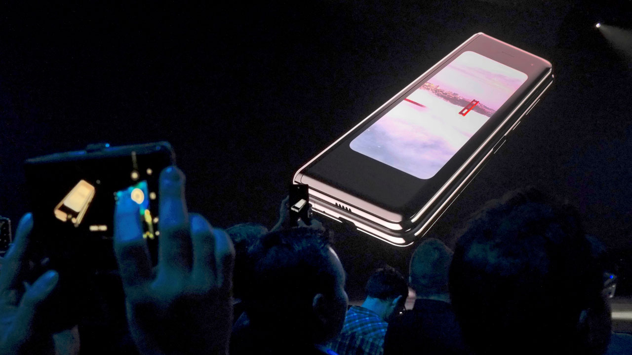 FILE PHOTO: The Samsung Galaxy Fold phone is shown on a screen at Samsung Electronics Co Ltd’s Unpacked event in San Francisco