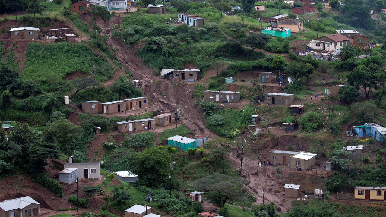 Damaged houses are seen after a flooding caused by heavy rains in Marianhill