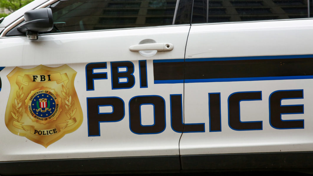 An FBI vehicle is seen outside the Federal Bureau of Investigation building ahead of the release of the Special Counsel Robert Mueller’s report in Washington
