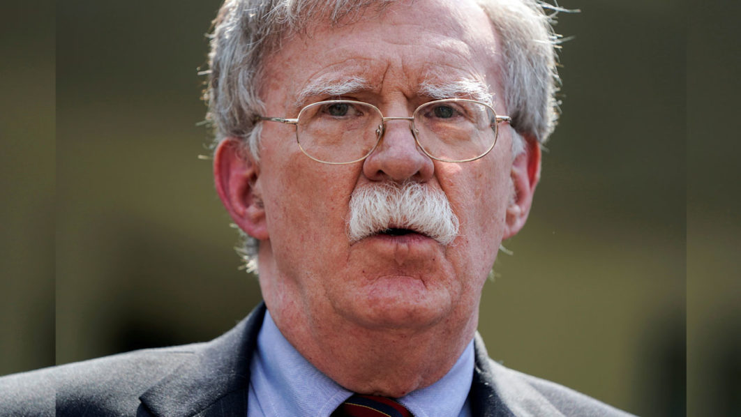 FILE PHOTO: White House national security adviser Bolton speaks about the political unrest in Venezuela, outside the White House in Washington