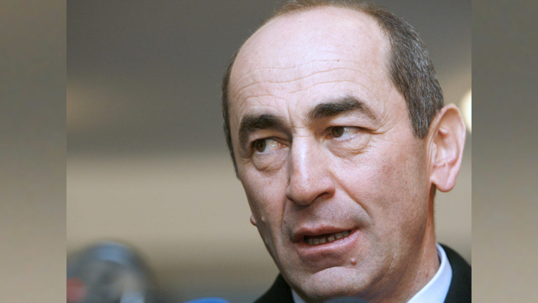 Armenia’s President Kocharyan speaks to the media after casting his ballot at a polling station in Yerevan