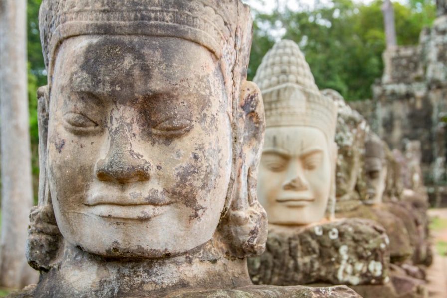 Angkor Wat – Bayon-Heads Leading-to AngkorThomBridge Cambodia by Minority Nomads