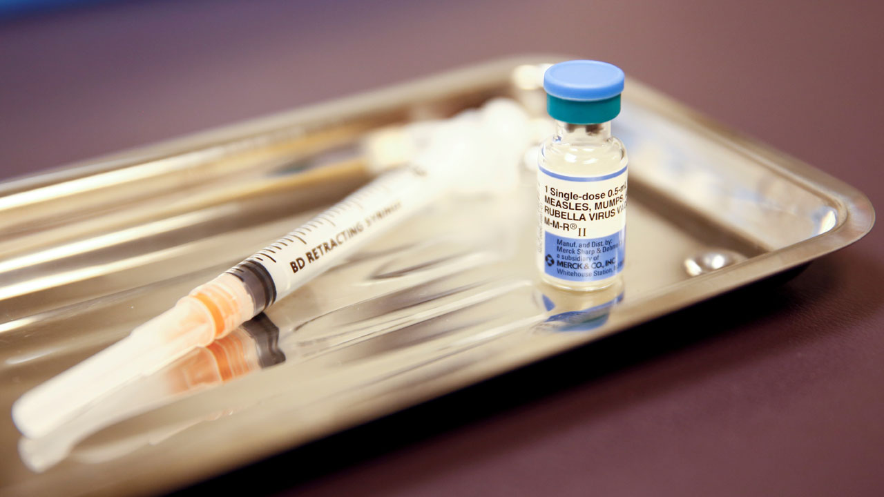 FILE PHOTO: A vial of the measles, mumps, and rubella (MMR) vaccine is pictured at the International Community Health Services clinic in Seattle
