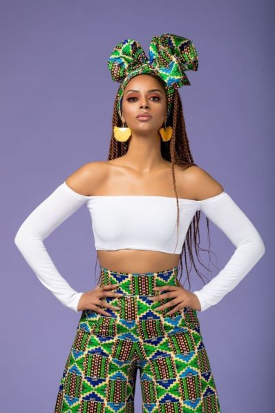 Model wearing off shoulder crop top, Photo. Grass-Fields
