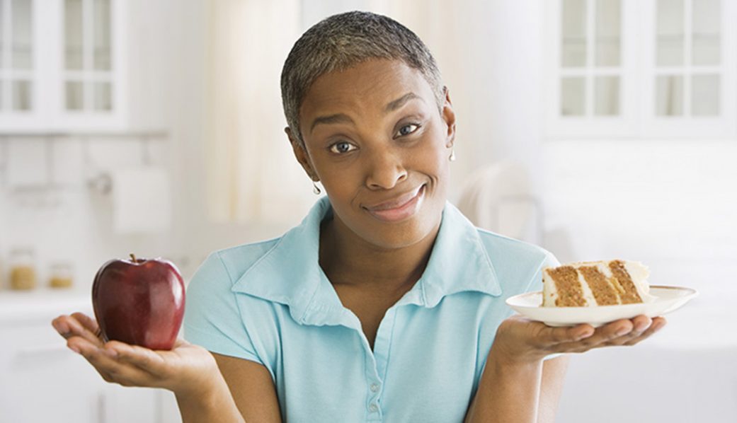 African woman choosing snack