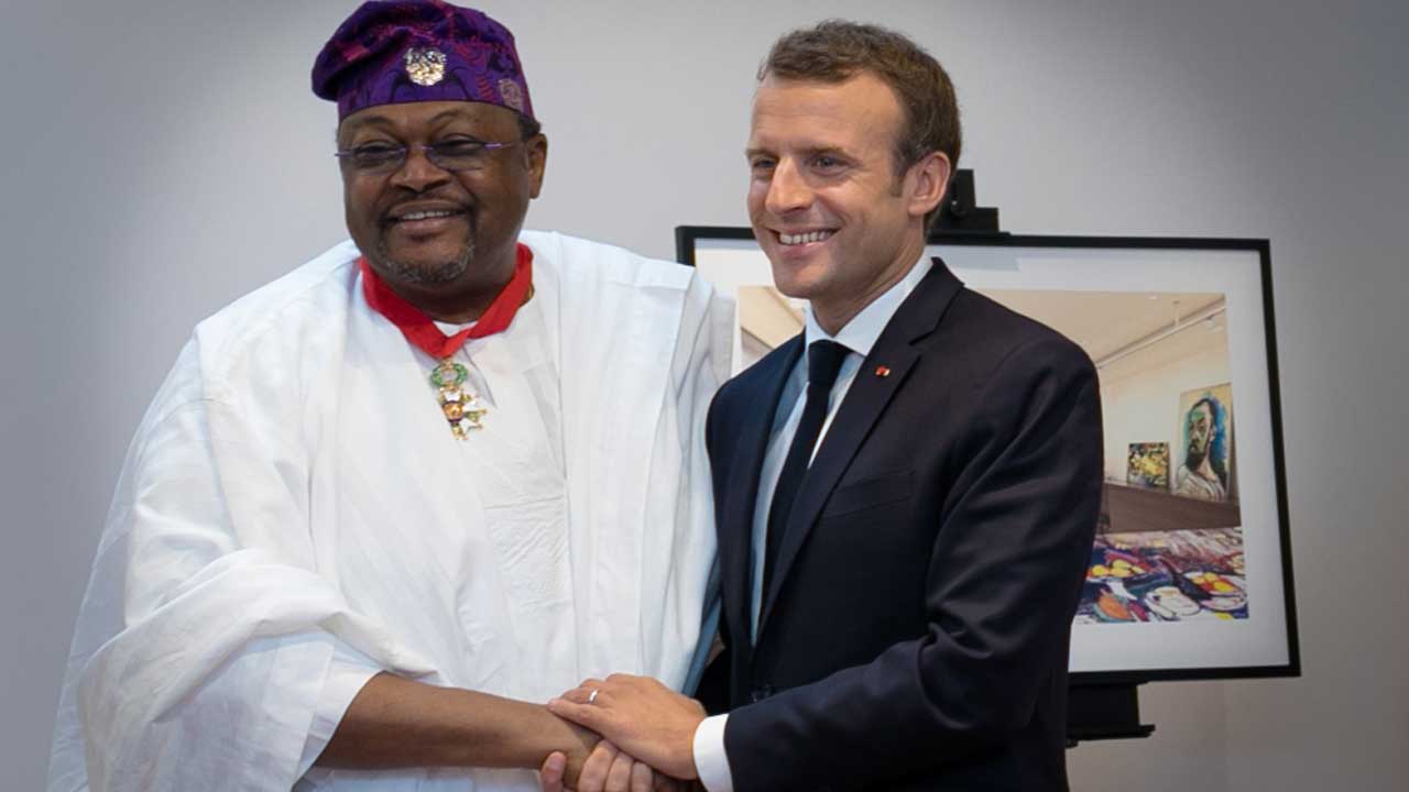 Dr-MIKE-ADENUGA-JR-GCON-CSG-WITH-FRENCH-PRESIDENT