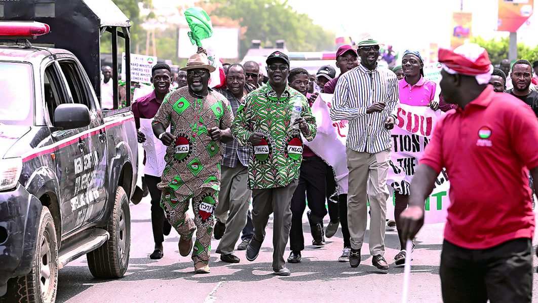 President of the Nigeria Labour Congress Ayuba Philibus Wabba leads anti-government protesters during a march in Abuja