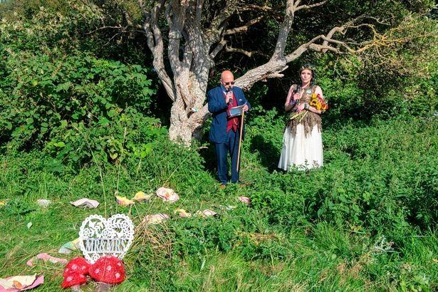 Kate Cunningham ‘marries’ a tree at Rimrose Valley Park in Merseyside