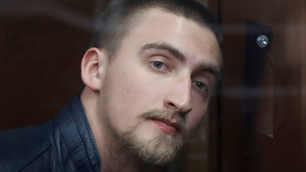 Defendant Ustinov attends a court hearing in Moscow