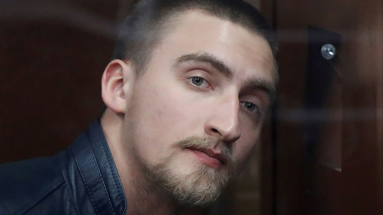 Defendant Ustinov attends a court hearing in Moscow