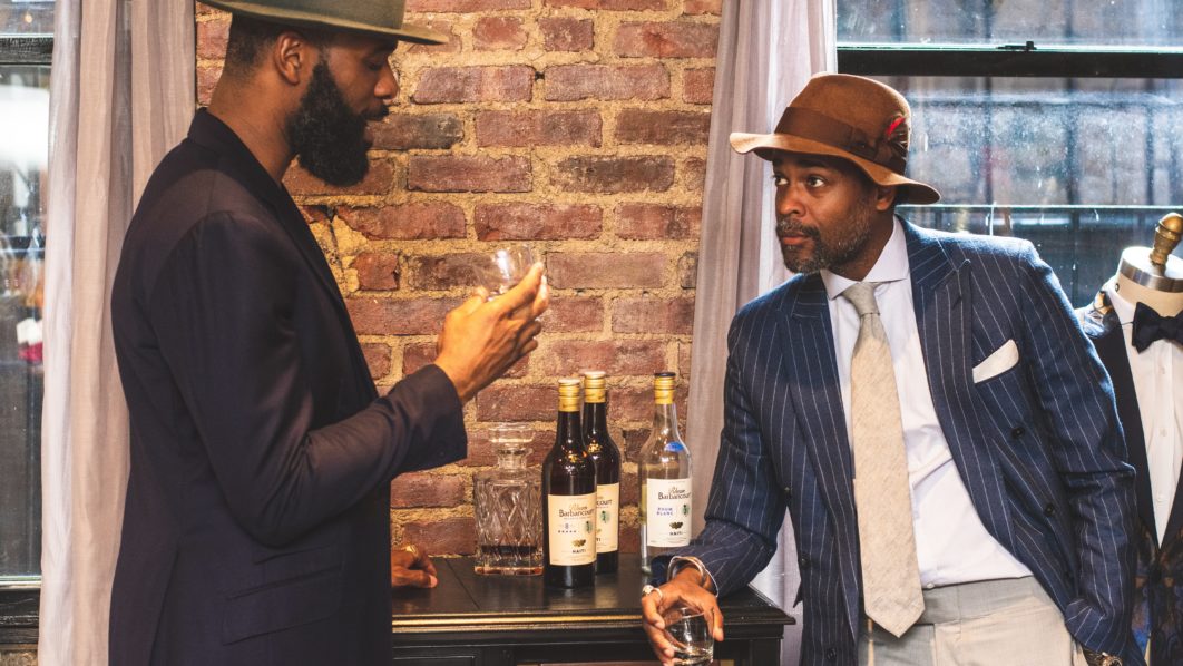 Men in suit at the bar – Pexels