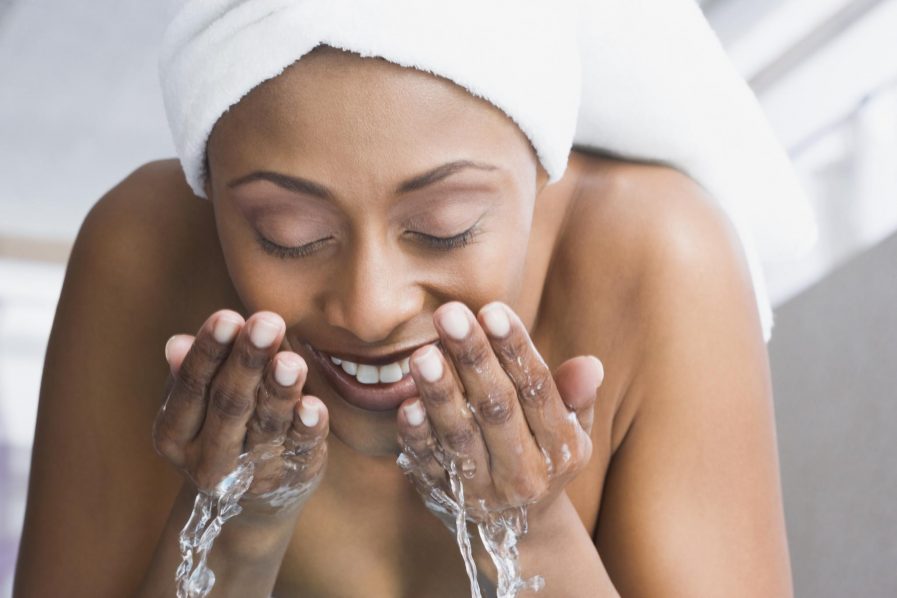 woman washing her face. Photo Pinterest