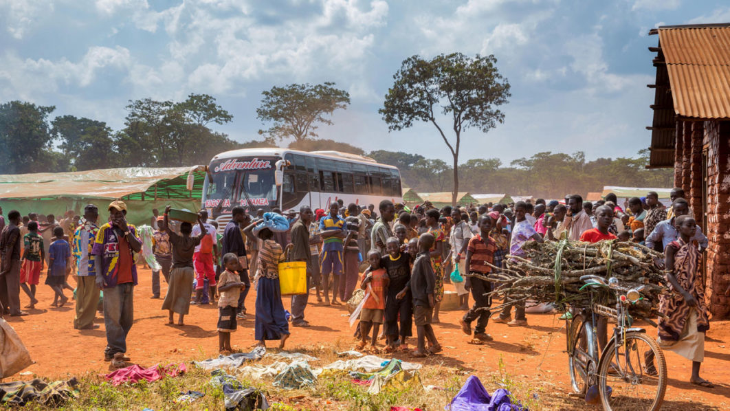 FILE PHOTO: PLAN INTERNATIONAL handout photo shows refugees from Burundi who fled the ongoing violence and political tension arriving at the Nyarugusu refugee camp in western Tanzania