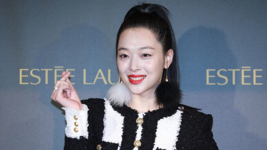 Sulli wears fluff earring to promote Estee Lauder in Seoul