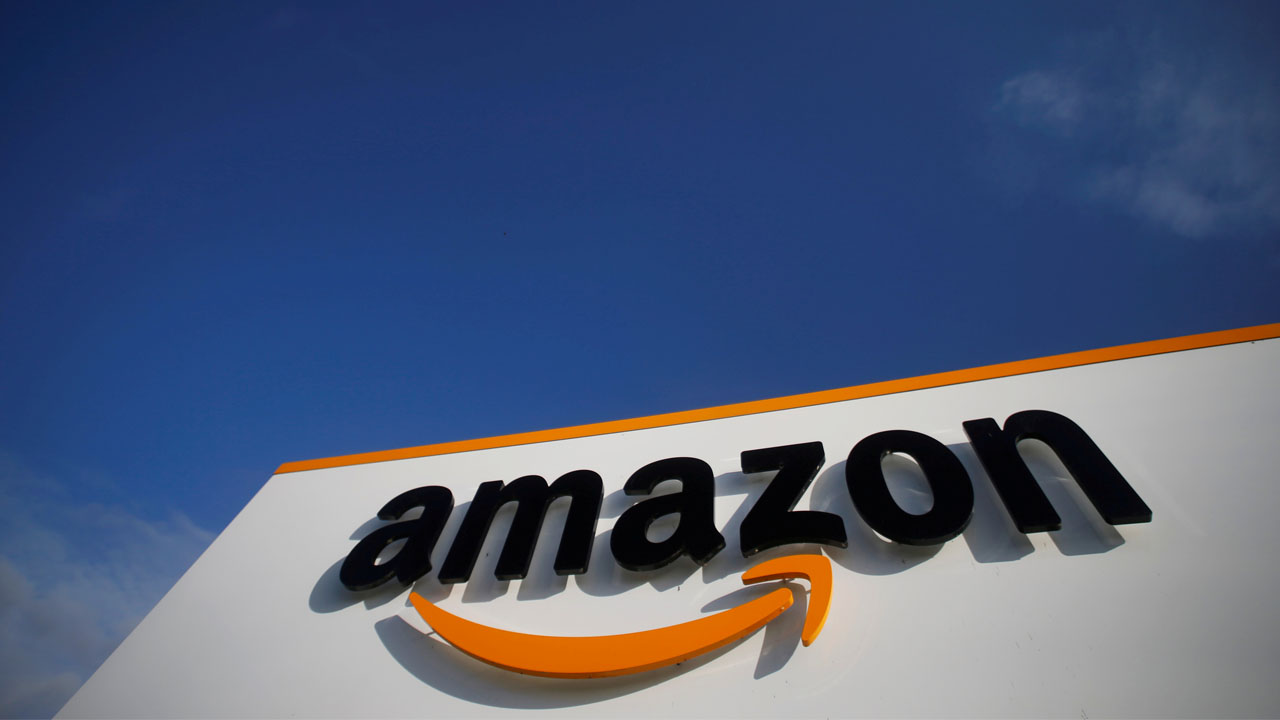 FILE PHOTO: The logo of Amazon is seen at the company logistics centre in Boves