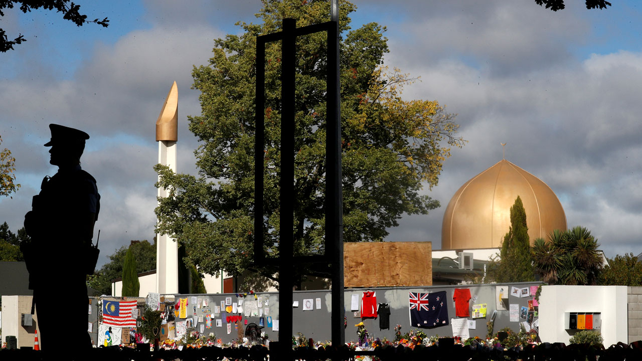 FILE PHOTO: A police officer stands guard outside Al Noor mosque in Christchurch