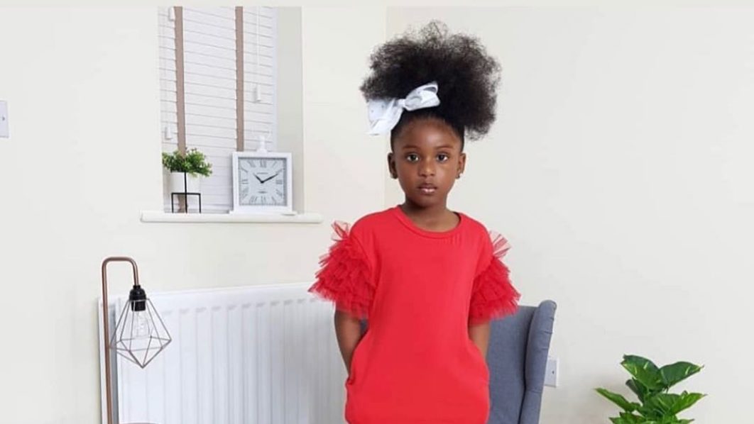 A girl in red shift dress – Image – Instagram – misskharisp
