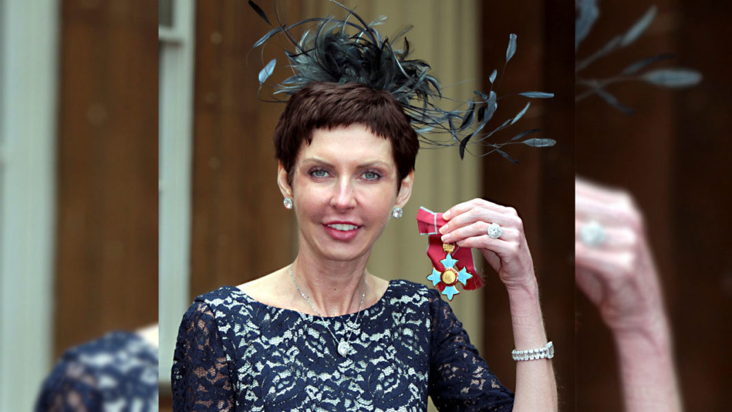 FILE PHOTO: bet365 Chief Executive Denise Coates poses with her CBE medal after being knighted by Britain’s Prince Charles at Buckingham Palace in London