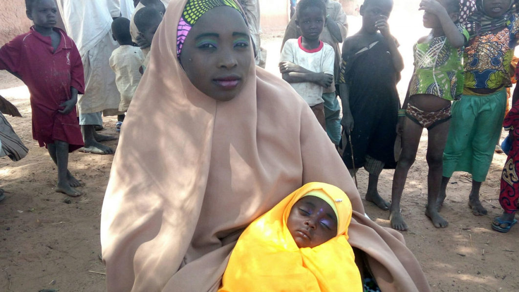 18-year-old-mother-holding-her-five-months-old-baby-girl-that-survived-from-a-premature-birth-2048×1362