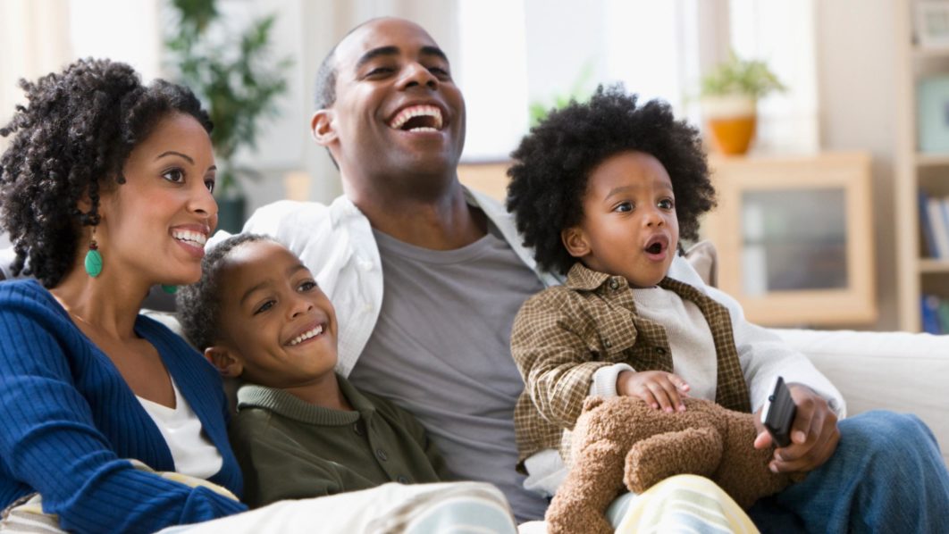 A family watching TV. Photo Shutterstock