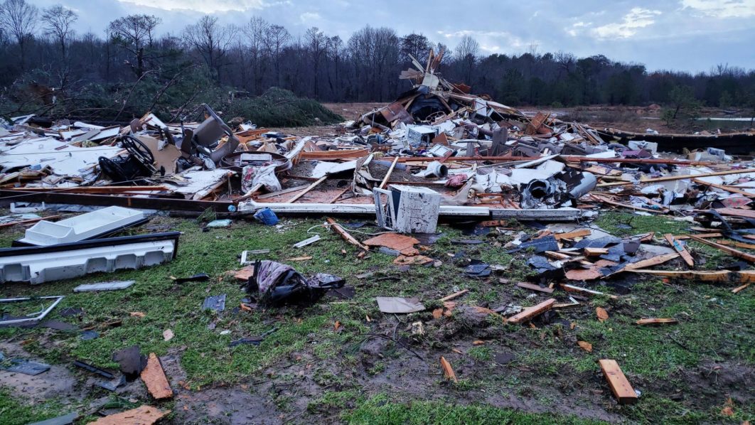 At least 11 dead as storms sweep through US south
