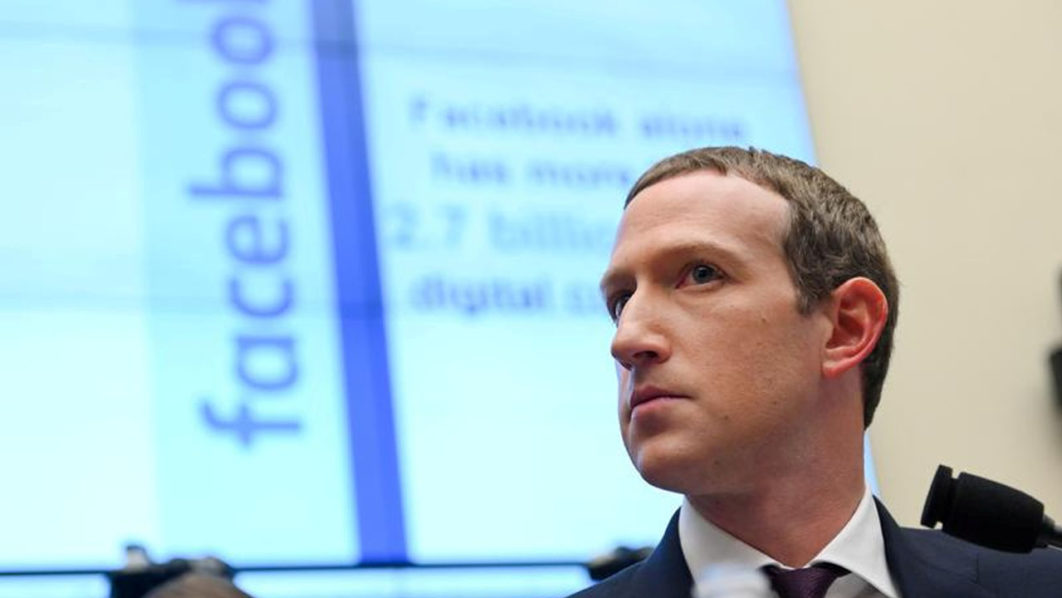 FILE PHOTO: Facebook Chairman and CEO Zuckerberg testifies at a House Financial Services Committee hearing in Washington