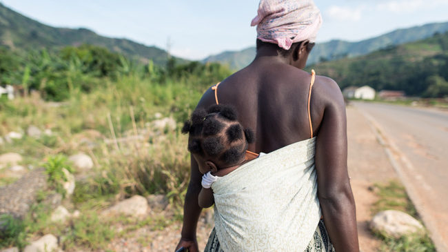 Woman backing baby – Offset