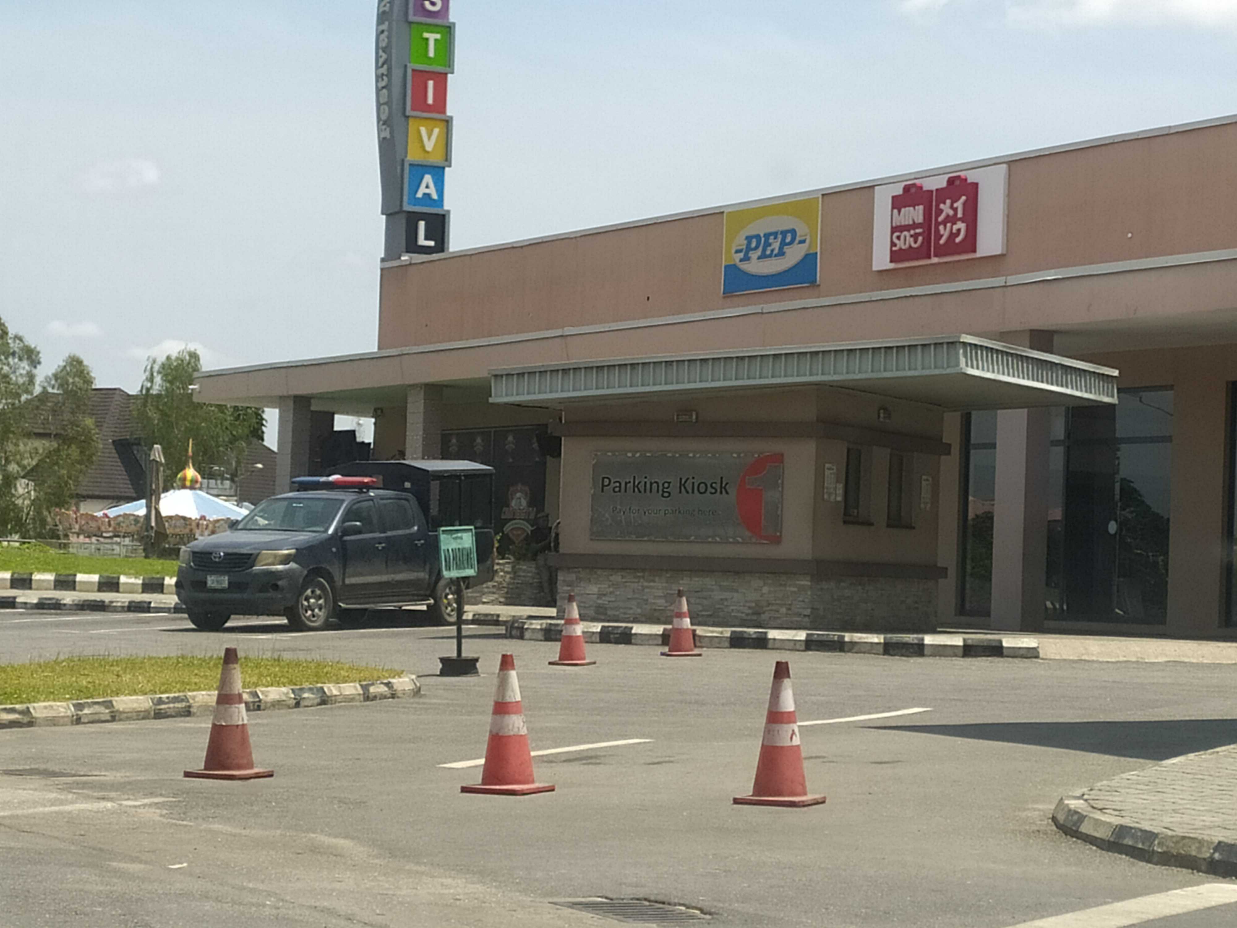 An unmarked police van is parked at the Festival Mall