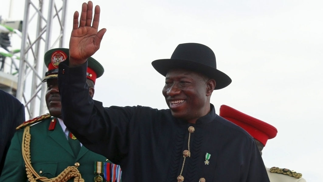 Nigeria’s outgoing President Goodluck Jonathan waves to people after the handover to incoming President Muhammadu Buhari at Eagle Square in Abuja