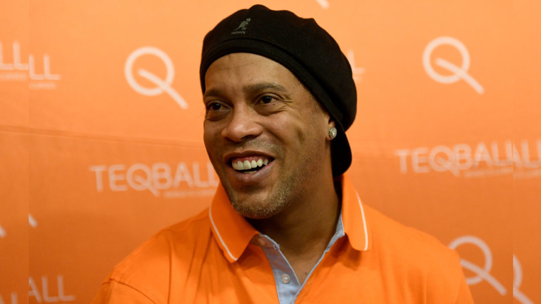 FILE PHOTO: Former FIFA player of the year and football World Cup winner Ronaldinho of Brazil listens during an interview with Reuters at the Teqball World Championships in Budapest
