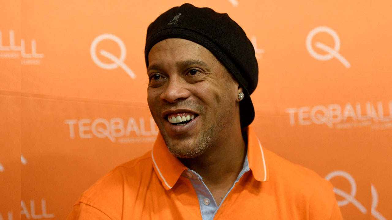 FILE PHOTO: Former FIFA player of the year and football World Cup winner Ronaldinho of Brazil listens during an interview with Reuters at the Teqball World Championships in Budapest