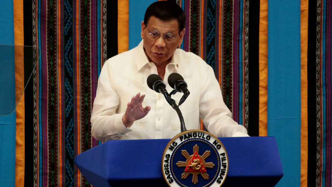 FILE PHOTO: Philippine President Rodrigo Duterte gestures during his fourth State of the Nation Address at the Philippine Congress in Quezon City