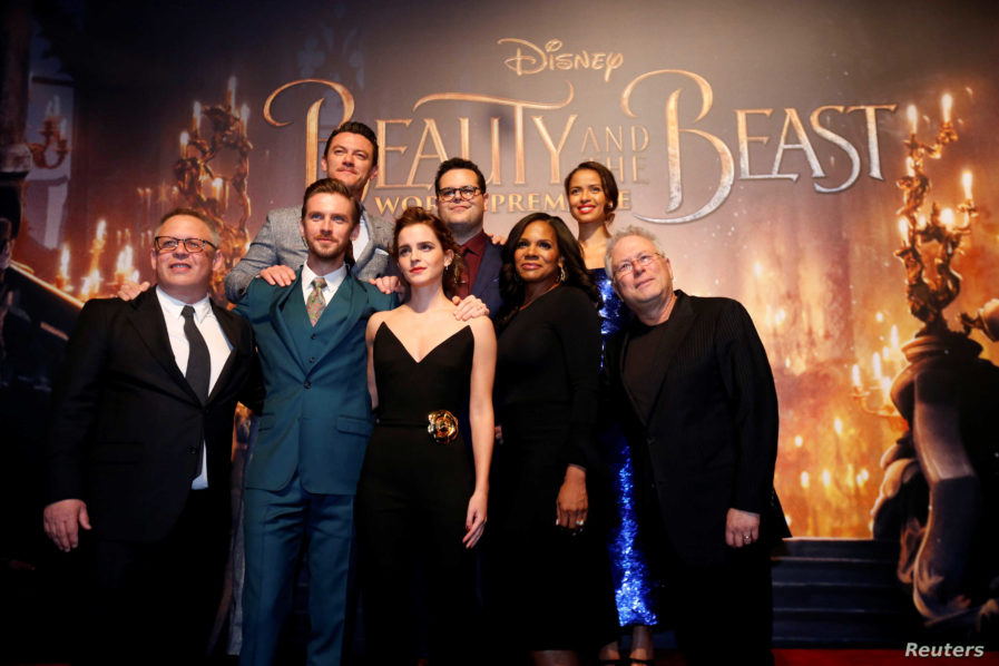 Director of the movie Condon and composer Menken pose with cast members Stevens, Evans, Watson, Gad, McDonald and Mbatha-Raw at the premiere of “Beauty and the Beast” in Los Angeles