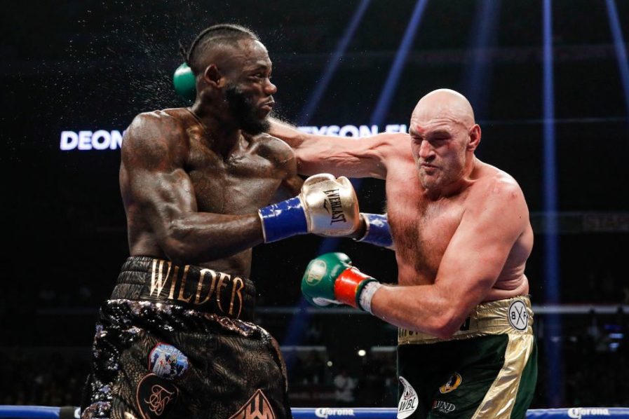 Tyson-Fury-and-Deontay-Wilder-fighting-TalkSport