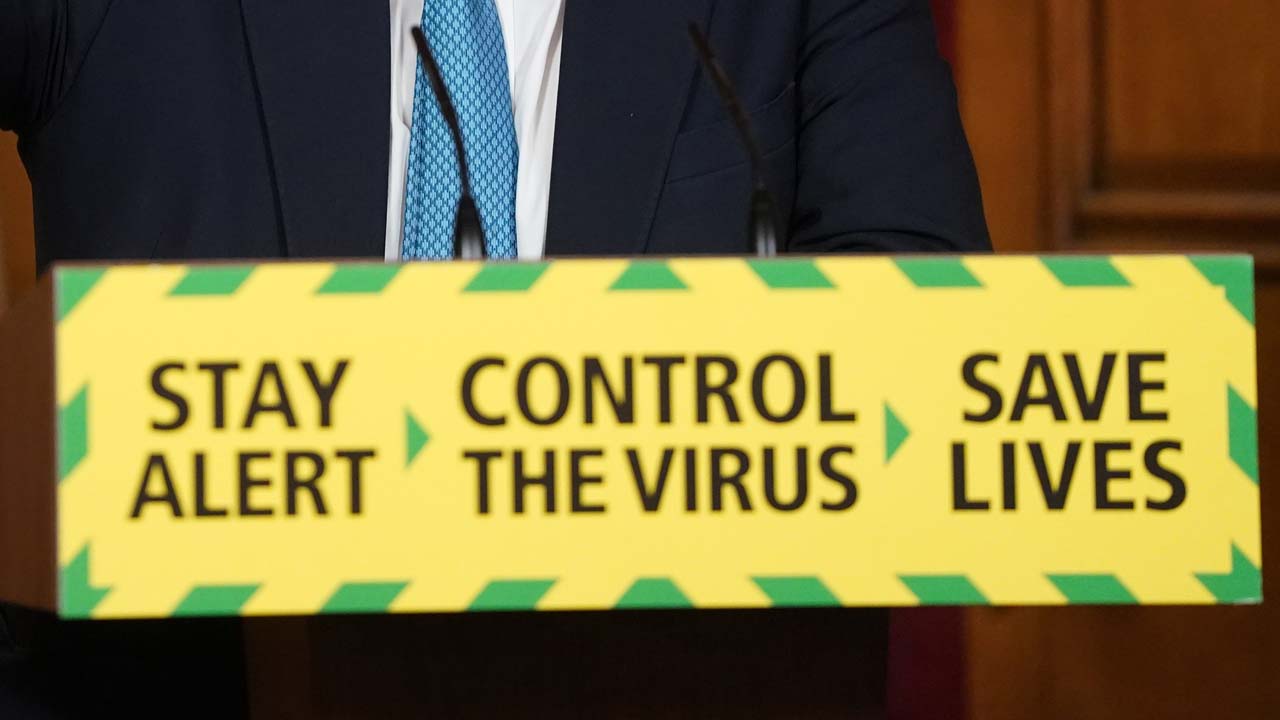 BRITAIN-HEALTH-VIRUS-POLITICS