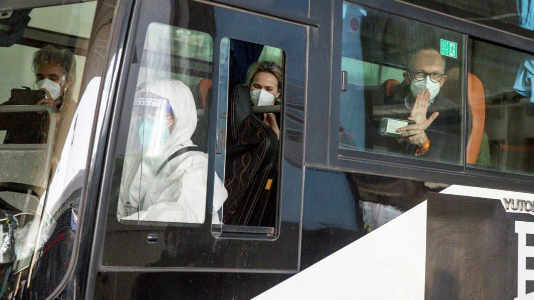 Members of the WHO team tasked with investigating the origins of the coronavirus disease (COVID-19) pandemic in Wuhan