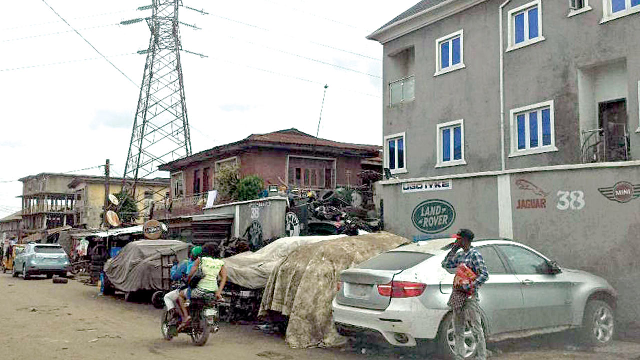 Unserviceable-vehicles-parked-along-Bello-Street,-in-front-of-UgoIyke-BMW-Ltd..