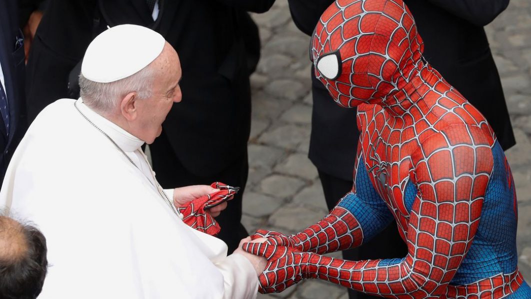 Pope Francis greets a person dressed as Spiderman after the general audience, amid the coronavirus disease (COVID-19) pandemic, at the Vatican, June 23, 2021. REUTERS/Remo Casilli