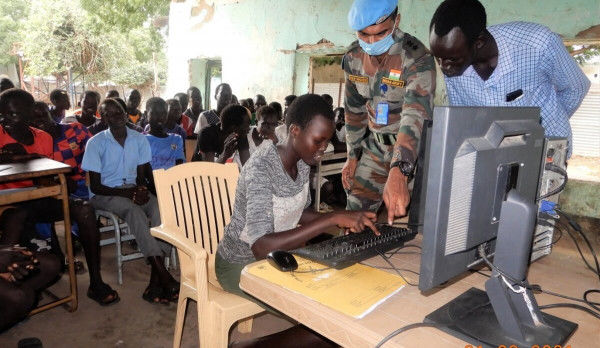 Indian peacekeepers in Malakal teach computer skills to pupils at Bander Primary School